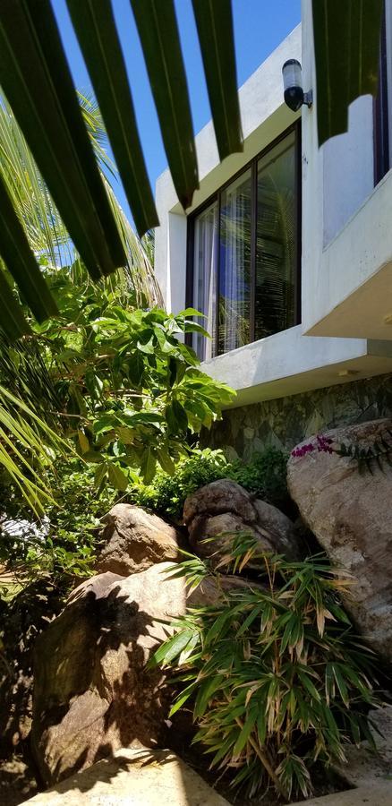 אונה ואטונה Rumassala Villas מראה חיצוני תמונה