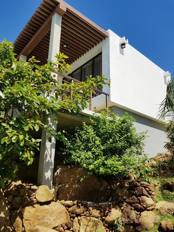 אונה ואטונה Rumassala Villas מראה חיצוני תמונה